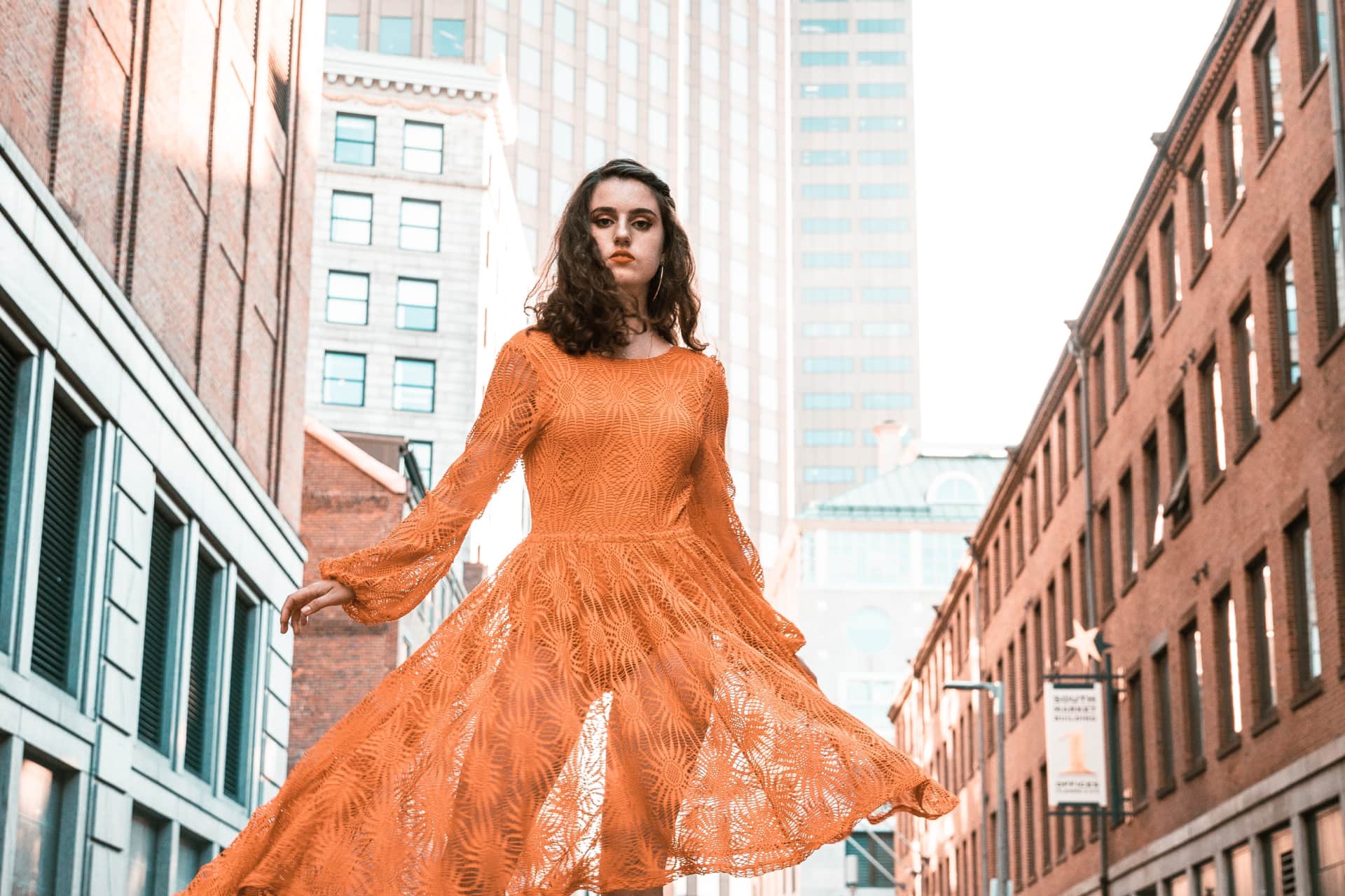 image of a girl wearing orange dress