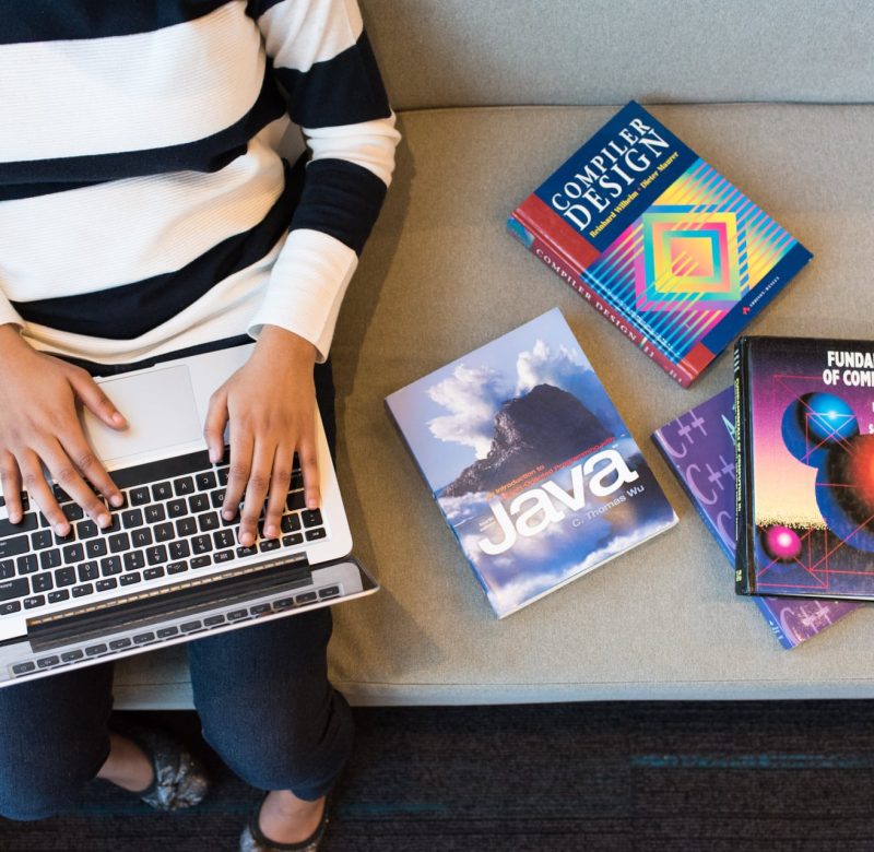 man sitting with laptop